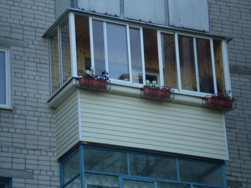 Отделка балкона сайдингом фото