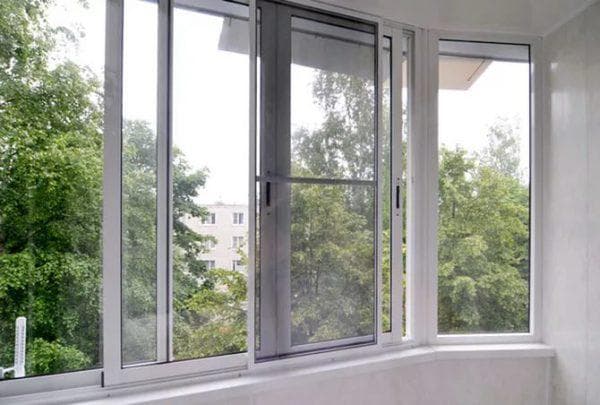 алюминиевые параллельно раздвижные окна на балкон