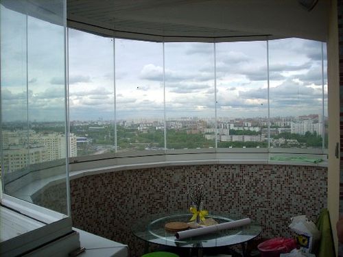 Панорамное остекление на балконе. Фото 5