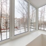 На фотографии современное остекление балкона в СПб