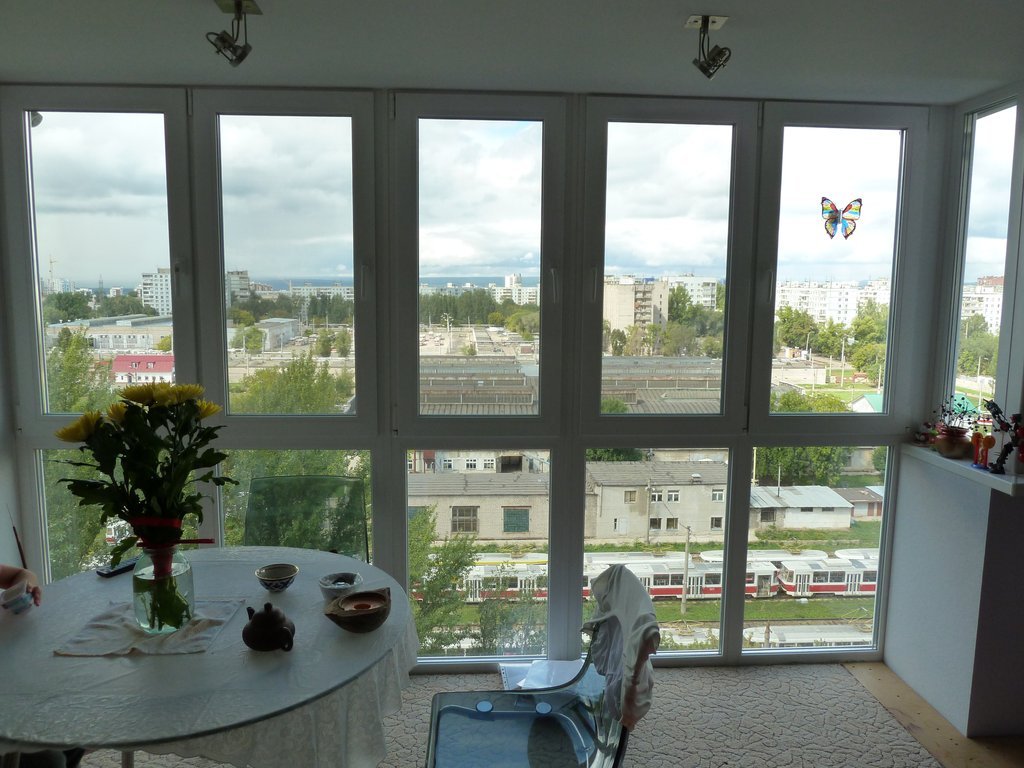 Панорамное остекление кухни с балконом